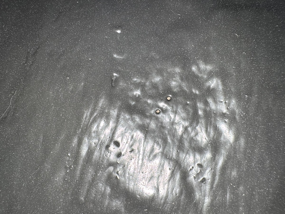 Pinholes in waterproofing, recorded on a fixing stage inspection in Schofields